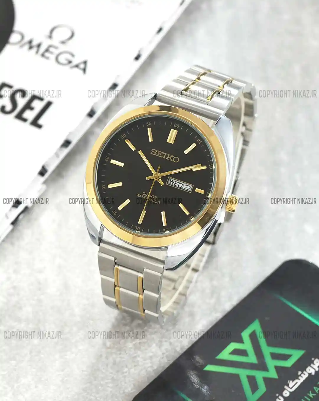 خرید ساعت مچی مردانه سیکو SEIKO کد 1264 موتور میوتا ژاپن بند استیل نقره ای طلایی و صفحه مشکی رنگ ثابت و دارای تقویم ایام هفته و ایام ماه